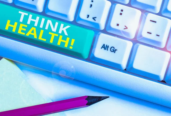 Texto de escritura de palabras Think Health. Concepto de negocio para el estado de completo bienestar físico mental y social Teclado de PC blanco con papel de nota vacío sobre el espacio de copia de la tecla de fondo blanco . — Foto de Stock