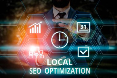 Kelime yazma metni Yerel Seo Optimizasyonu. Arama Görünürlüğünü En İyi Listeye Yükseltmek için İş Konsepti Akıllı aygıt kullanılarak sunulan erkek giyimi resmi iş giysisi.