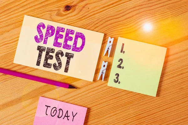 Conceptual hand writing showing Speed Test. Business photo text psychological test for the maximum speed of performing a task Colored crumpled papers wooden floor background clothespin. — Stock Photo, Image