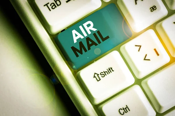 Conceptual hand writing showing Air Mail. Business photo showcasing the bags of letters and packages that are transported by aircraft. — Stock Photo, Image