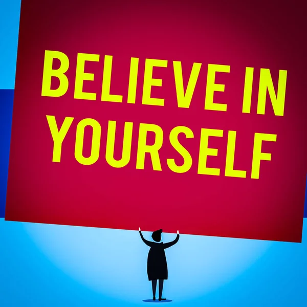 Writing note showing Believe In Yourself. Business photo showcasing common piece of advice that you can do everything Short hair woman standing dress hands up holding blank rectangle. — Stock Photo, Image