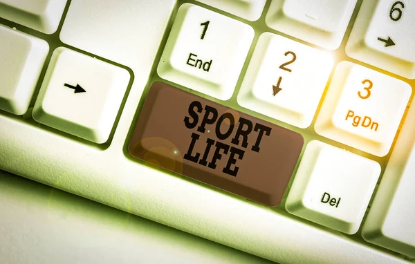 Word writing text Sport Life. Business concept for Fond of sports or other outdoor activities Physically active White pc keyboard with empty note paper above white background key copy space. — Stockfoto
