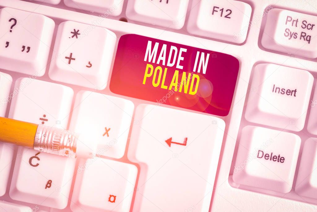 Text sign showing Made In Poland. Conceptual photo A product or something that is analysisufactured in Poland White pc keyboard with empty note paper above white background key copy space.