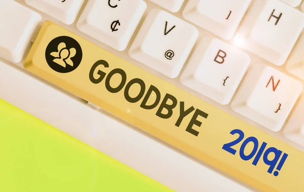 Writing note showing Goodbye 2019. Business concept for express good wishes when parting or at the end of last year