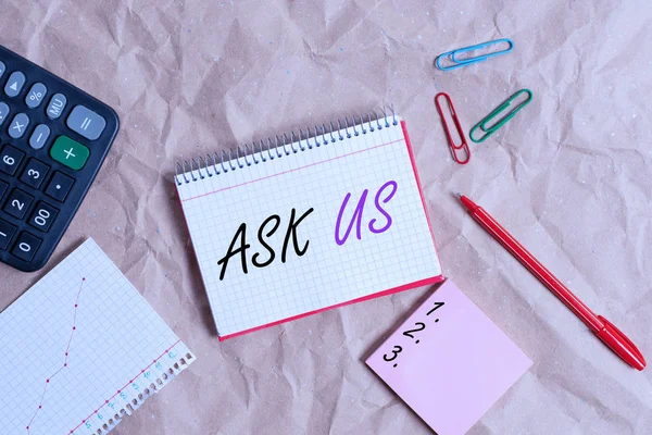 Conceptual hand writing showing Ask Us. Concept meaning accepting questions or inquiry from showing Will answers any doubts Papercraft desk square spiral notebook office study supplies