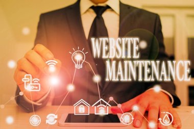 Text sign showing Website Maintenance. Business photo showcasing act of regularly checking your website for issues