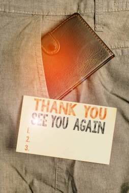 Writing note showing Thank You See You Again. Business concept for Appreciation Gratitude Thanks I will be back soon Small wallet inside trouser front pocket near notation paper