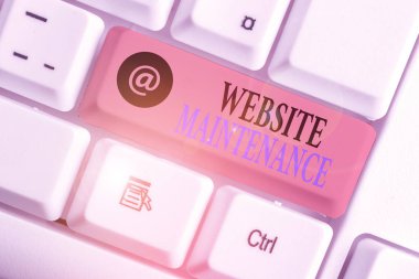 Text sign showing Website Maintenance. Business photo showcasing act of regularly checking your website for issues