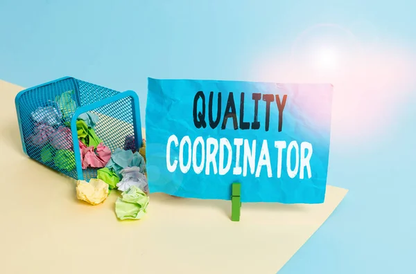 Conceptual hand writing showing Quality Coordinator. Concept meaning monitor and improve the quality of analysisufactured products Trash bin crumpled paper clothespin reminder office supplies