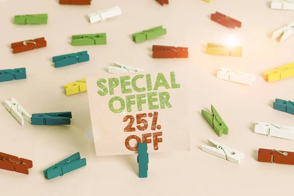Text sign showing Special Offer 25 Off. Business photo showcasing Discounts promotion Sales Retail Marketing Offer Colored clothespin papers empty reminder pink floor background office pin