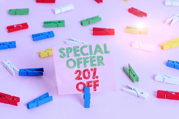 Text sign showing Special Offer 20 Off. Business photo showcasing Discounts promotion Sales Retail Marketing Offer Colored clothespin papers empty reminder pink floor background office pin