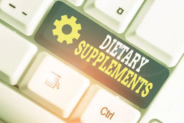 Writing note showing Dietary Supplements. Business concept for Product taken orally intended to supplement ones diet