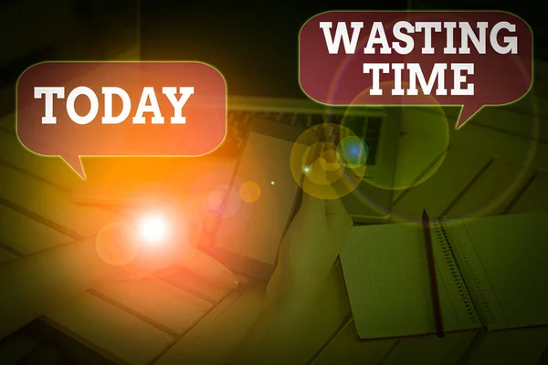 Writing note showing Wasting Time. Business concept for act of spending time doing something that is unnecessary