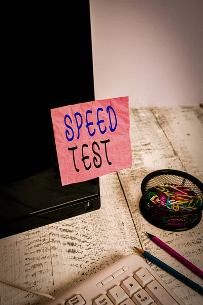 Handwriting text writing Speed Test. Conceptual photo psychological test for the maximum speed of performing a task Note paper taped to black computer screen near keyboard and stationary