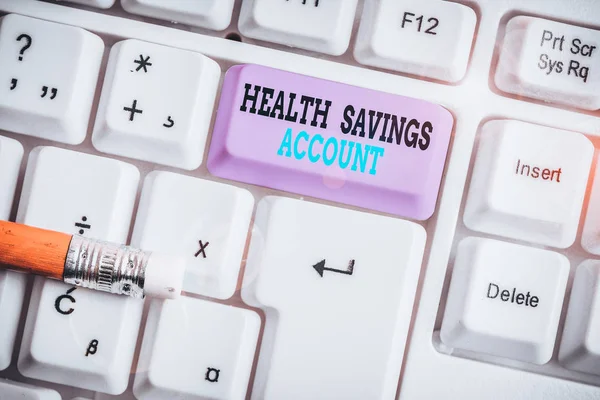 Word writing text Health Savings Account. Business photo showcasing users with High Deductible Health Insurance Policy White pc keyboard with empty note paper above white background key copy space