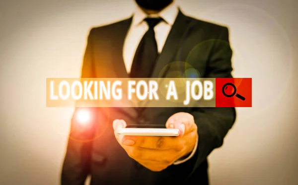 Word writing text Looking For A Job. Business photo showcasing Unemployed seeking work Recruitment Huanalysis Resources Male human wear formal work suit hold smart hi tech smartphone use one hand