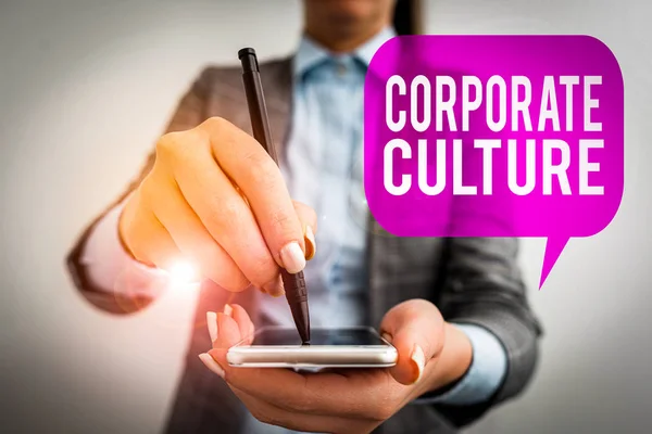 Word writing text Corporate Culture. Business photo showcasing pervasive values and attitudes that characterize a company Business woman pointing in empty space with pen