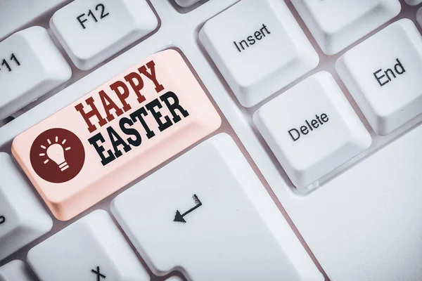 Word writing text Happy Easter. Business photo showcasing the Christian celebration of the Resurrection of Christ White pc keyboard with empty note paper above white background key copy space