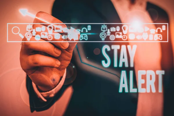 Text sign showing Stay Alert. Business photo showcasing Paying full attention to things around Quick to see or understand