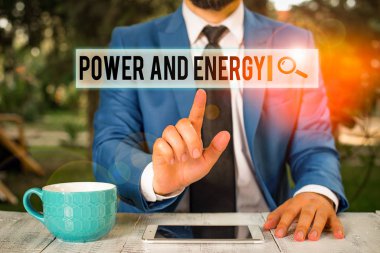 Power and Energy 'nin el yazısı. Kavramsal fotoğraf. Elektrik dağıtım endüstrisi. Enerji işadamı.