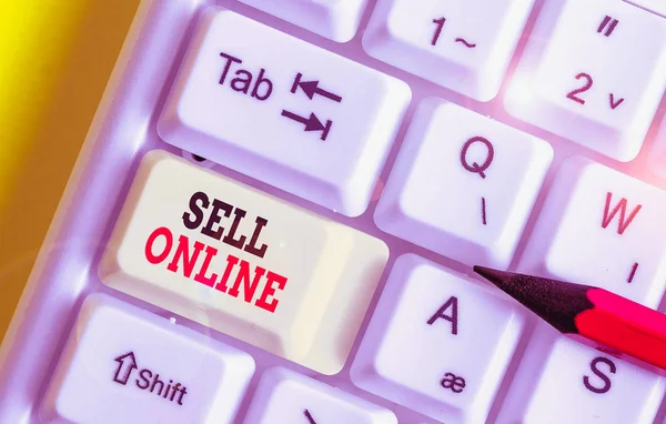 Writing note showing Sell Online. Business concept for directly sell goods or services to a buyer over the Internet