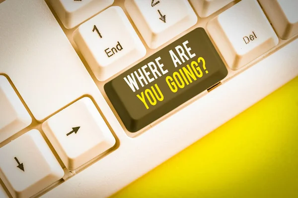 Conceptual hand writing showing Where Are You Going Question. Concept meaning asking someone where he is heading to White pc keyboard with note paper above the white background