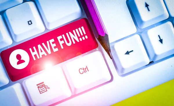 Word writing text Have Fun. Business photo showcasing wish somebody good and enjoyable time when they do something White pc keyboard with empty note paper above white background key copy space