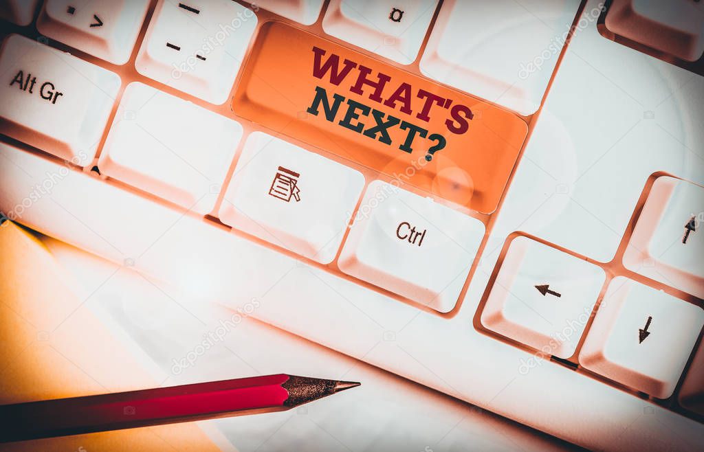 Text sign showing What S Next Question. Business photo showcasing asking demonstrating about his coming actions or behaviors White pc keyboard with empty note paper above white background key copy space