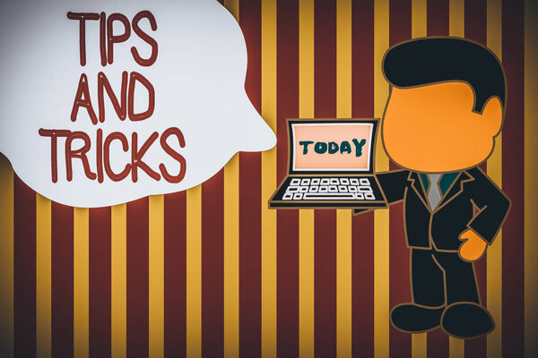 Writing note showing Tips And Tricks. Business concept for piece of inside facts specially in betting or investing Standing professional businessman holding open laptop right hand side