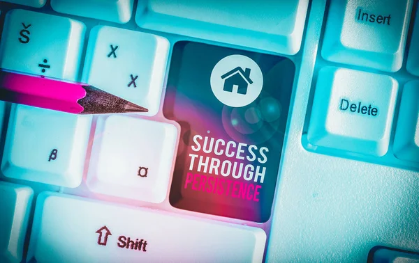 Text sign showing Success Through Persistence. Business photo text never give up in order to reach achieve dreams White pc keyboard with empty note paper above white background key copy space