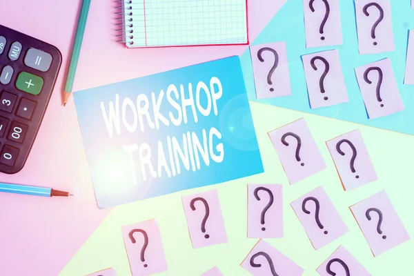 Word writing text Workshop Training. Business photo showcasing participants carry out a number of training activities Mathematics stuff and writing equipment above pastel colours background