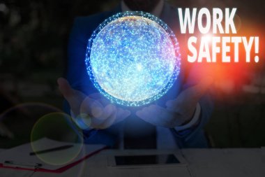 El yazısı, İş Güvenliği. Nasa tarafından desteklenen bu imajın çalışanlarının sağlığını sağlamak için kavramsal fotoğraf politikaları ve prosedürler uygulanmakta