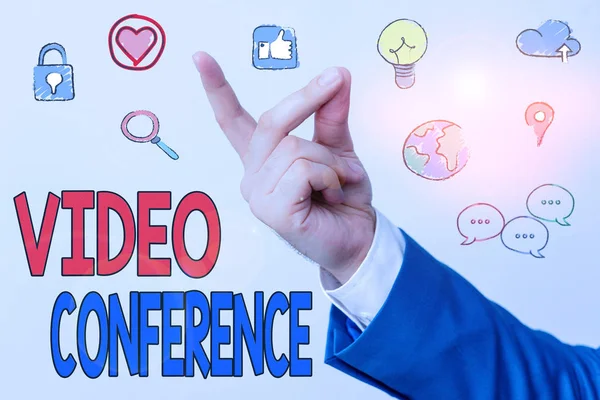 Tekst schrijven Videoconferentie. Business concept voor het tonen in afgelegen plaatsen houden facetto face vergaderingen. — Stockfoto