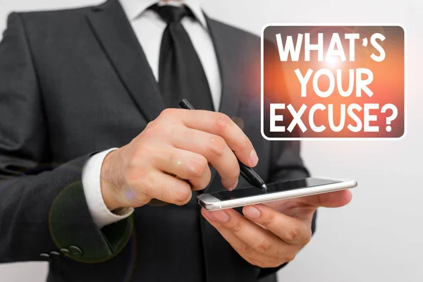 Writing note showing What s is Your Excuse question. Business photo showcasing Explanations for not doing something Inquiry Male human wear formal work suit hold smartphone using hand. — Stock Photo, Image