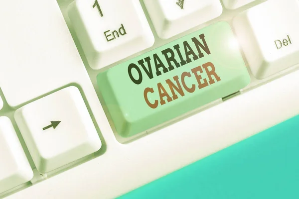 Writing note showing Ovarian Cancer. Business concept for any cancerous growth that forms in the tissues of the ovary