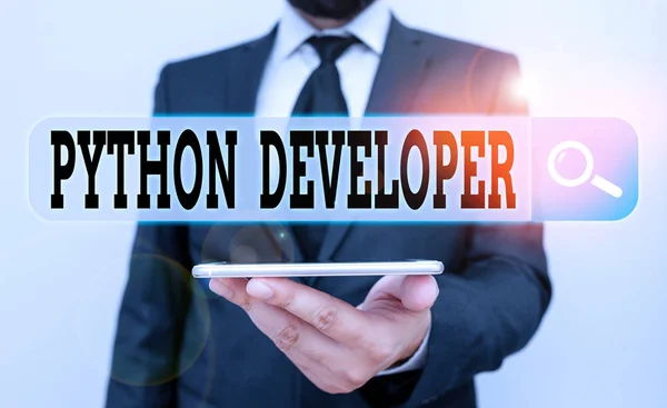 Conceptual hand writing showing Python Developer. Concept meaning responsible for writing serverside web application logic Male human wear formal work suit hold smartphone using hand