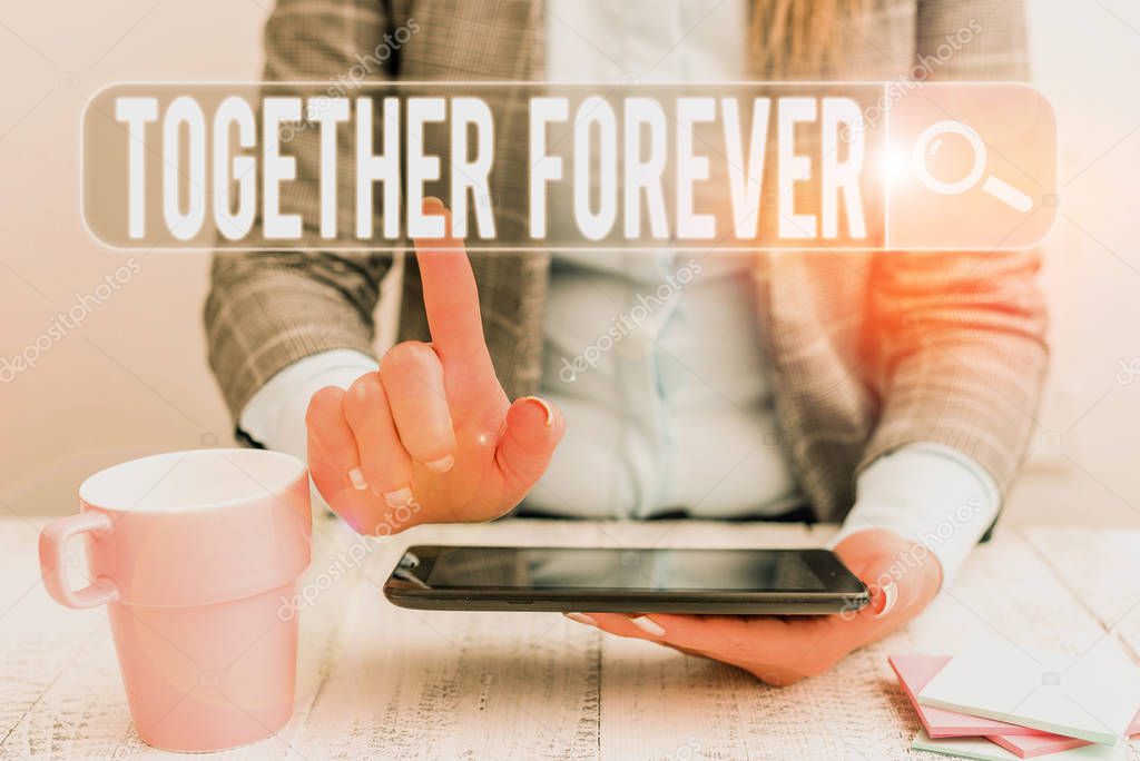 Handwriting text Together Forever. Conceptual photo showing who promise to love one another for eternity Business woman sitting with mobile phone and cup of coffee on the table
