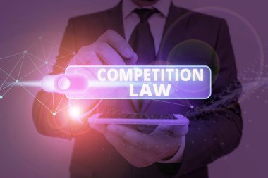 Text sign showing Competition Law. Business photo showcasing regulating the monopoly and unfair business practices