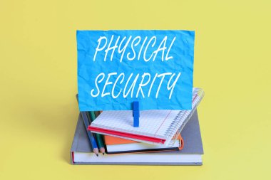 Word writing text Physical Security. Business photo showcasing designed to deny unauthorized access to facilities Book pencil rectangle shaped reminder notebook clothespin office supplies