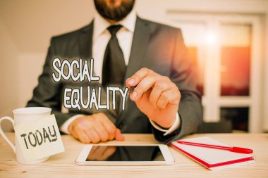 Word writing text Social Equality. Business concept for applies concerns of justice and fairness to social policy Male human wear formal clothes present presentation use hi tech smartphone.