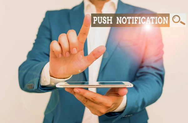 Word writing text Push Notification. Business concept for automated message sent by an application to a user Businessman with pointing finger in front of him.