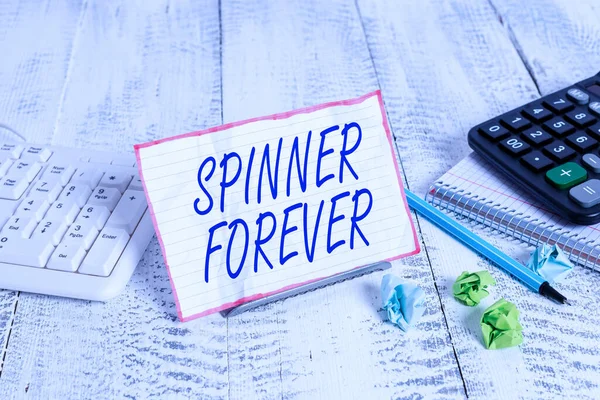 Spinner Forever Gösteren Kavramsal Yazısı Konsept Bilgisayar Klavyesi Sayfaları Arasında — Stok fotoğraf