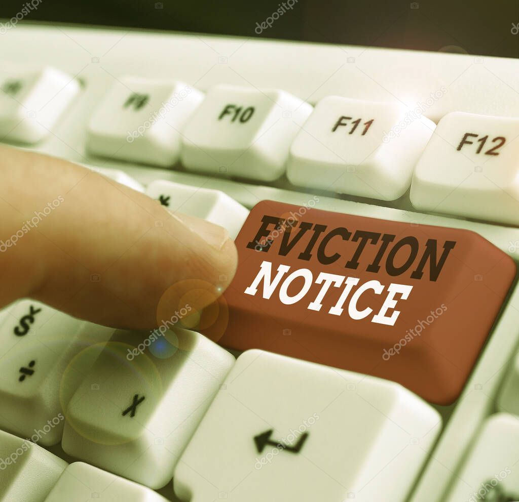Writing note showing Eviction Notice. Business concept for an advance notice that someone must leave a property