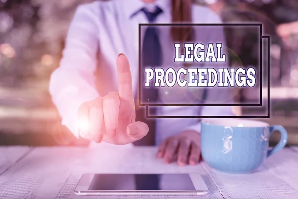 Writing note showing Legal Proceedings. Business photo showcasing procedure instituted in a court of law to acquire benefit Business woman sitting by the table with cup of coffee and mobile phone.