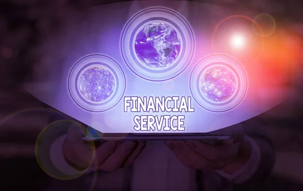 金融サービスを示す概念的な手書き。金融業界が提供する経済サービスを紹介するビジネス写真この画像の要素はNasaによって提供されます. — ストック写真