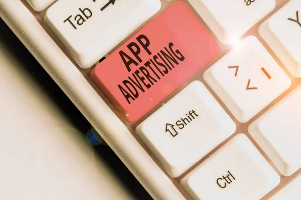 Writing note showing App Advertising. Business concept for developers get paid to serve advertisements in mobile app