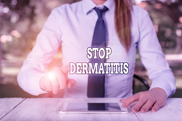 Conceptual hand writing showing Stop Dermatitis. Business photo text Put an end in irritation caused by touching something Female business person sitting by table and holding mobile phone. — Stok fotoğraf
