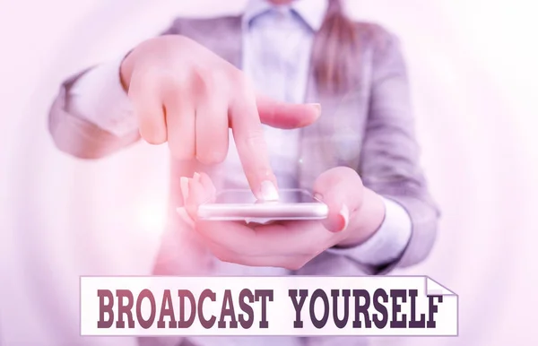 Conceptual hand writing showing Broadcast Yourself. Business photo text broadcasting your viewing interests for all to see Business woman points with finger on touch screen. — Stock Photo, Image