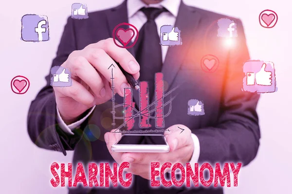 Word writing text Sharing Economy. Business concept for collaborative consumption or peer to peer based sharing.