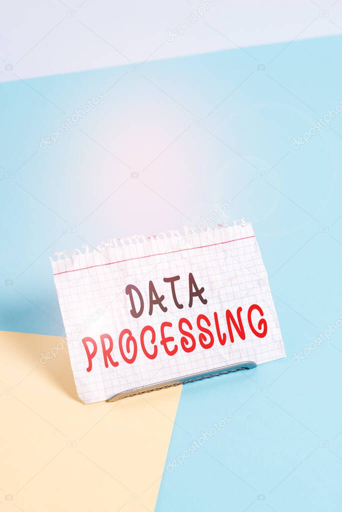 Text sign showing Data Processing. Business photo text collection and manipulation of items of data to produce Paper placed tilted above buffer wire on soft pastel multi colours backdrop